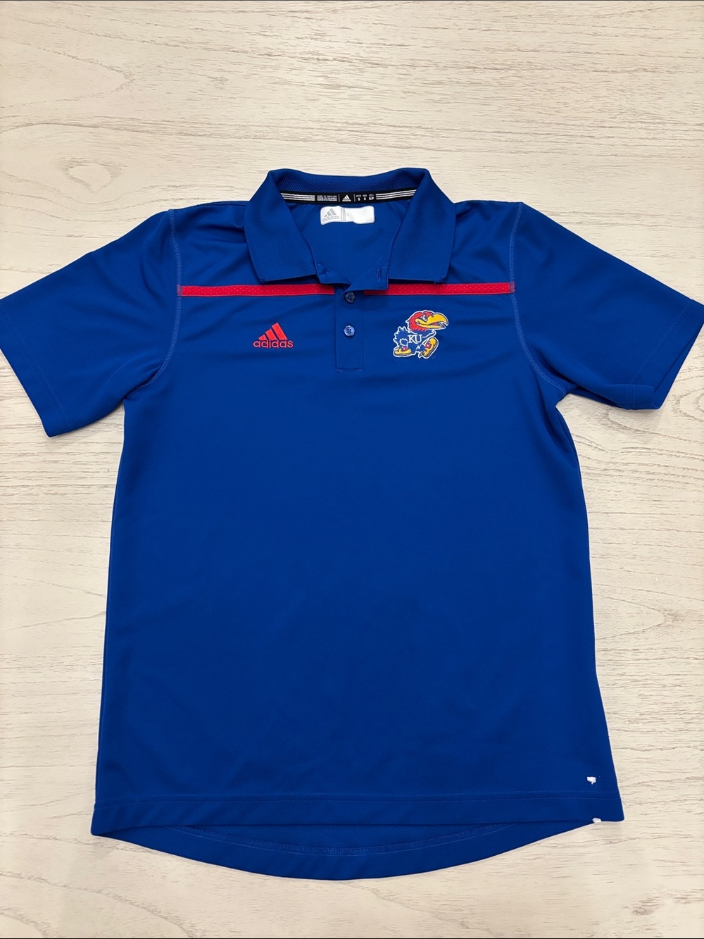Adidas Kansas Jayhawks (KU) performance polo shirt in men’s size Small.